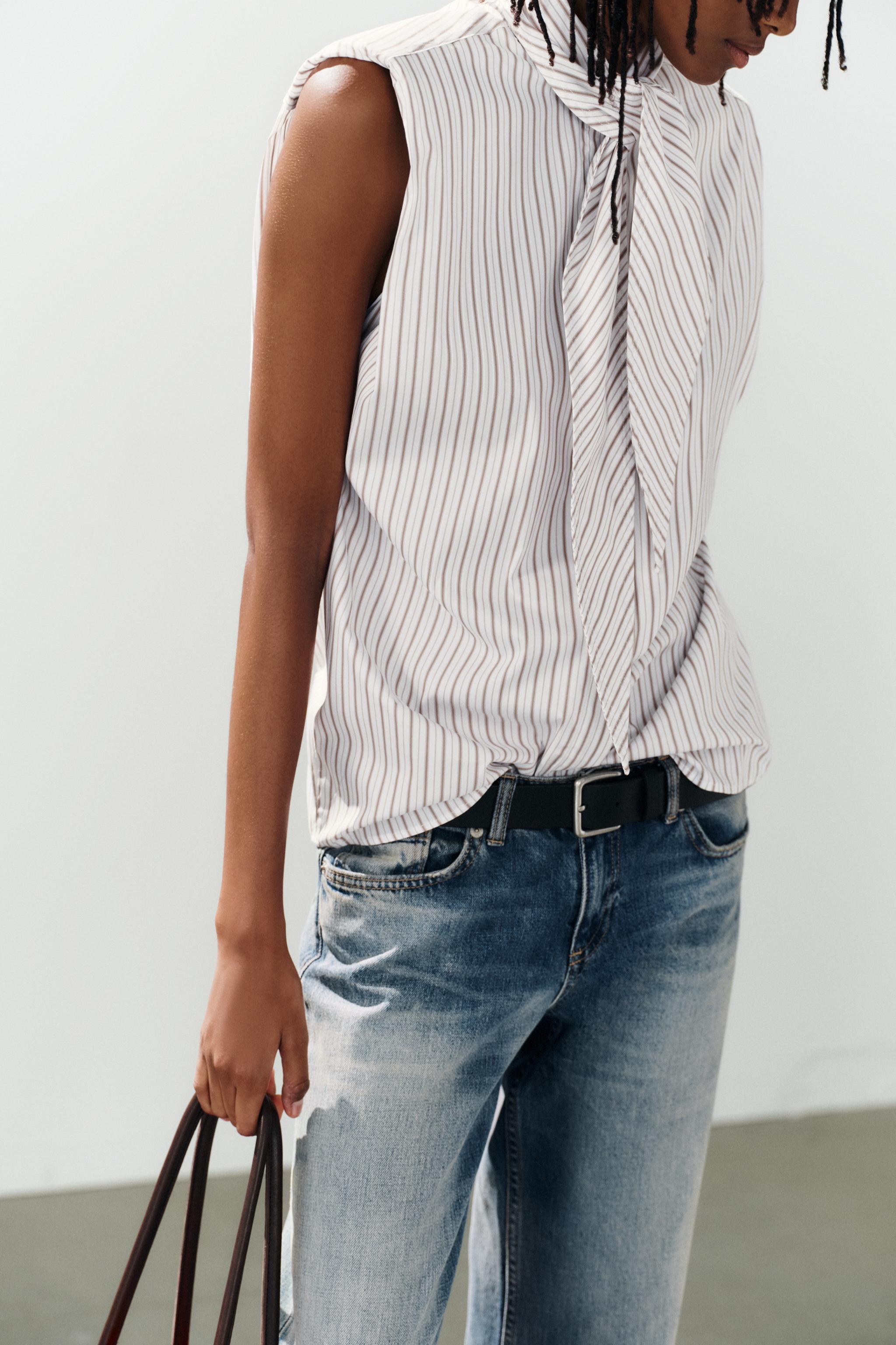 STRIPED TIE-NECK SHIRT WITH SHOULDER PADS